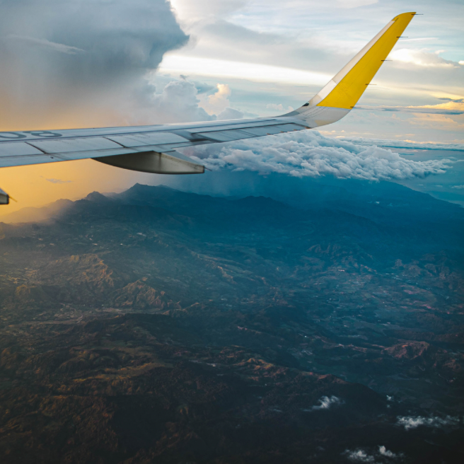 Two happy friends taking a selfie while traveling